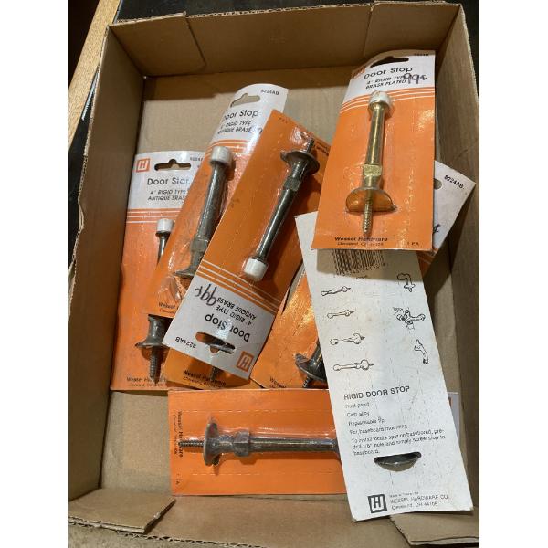 BOX OF ASSORTED DOOR STOPS