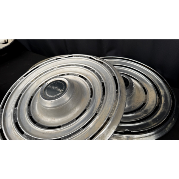 6 ASSORTED HUBCAPS 2 FORD TRUCKS 4 PONTIAC