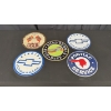 Image 1 : 5 SMALL ROUND METAL SIGNS 12" INCUDES PONTIAC AND ROAD RUNNER
