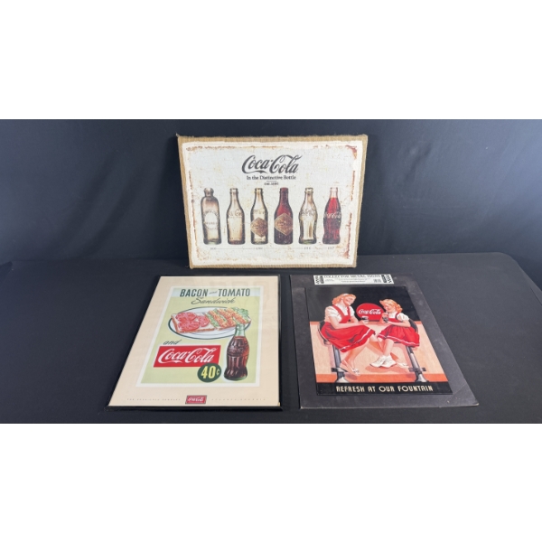 3 COCA-COLA ADVERTISING SIGNS (CANVAS, FRAMED PROMO, METAL SIGN) 23" X 16"