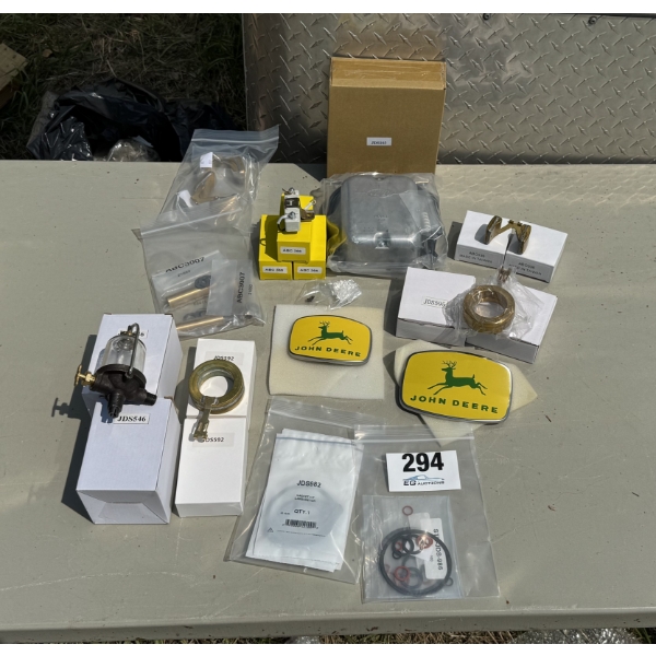 ASSORTED JOHN DEERE SMALL PARTS, EMBLEMS, & FUEL STRAINER