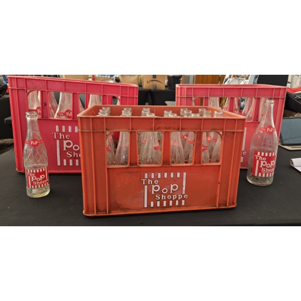 COLLECTION OF POP SHOPPE BOTTLES AND CASES 